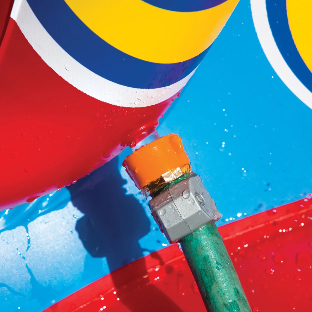 WOW Sports Slide N Smile Inflatable Pool Slide with Sprinklers for Kids and Adults - Womvr