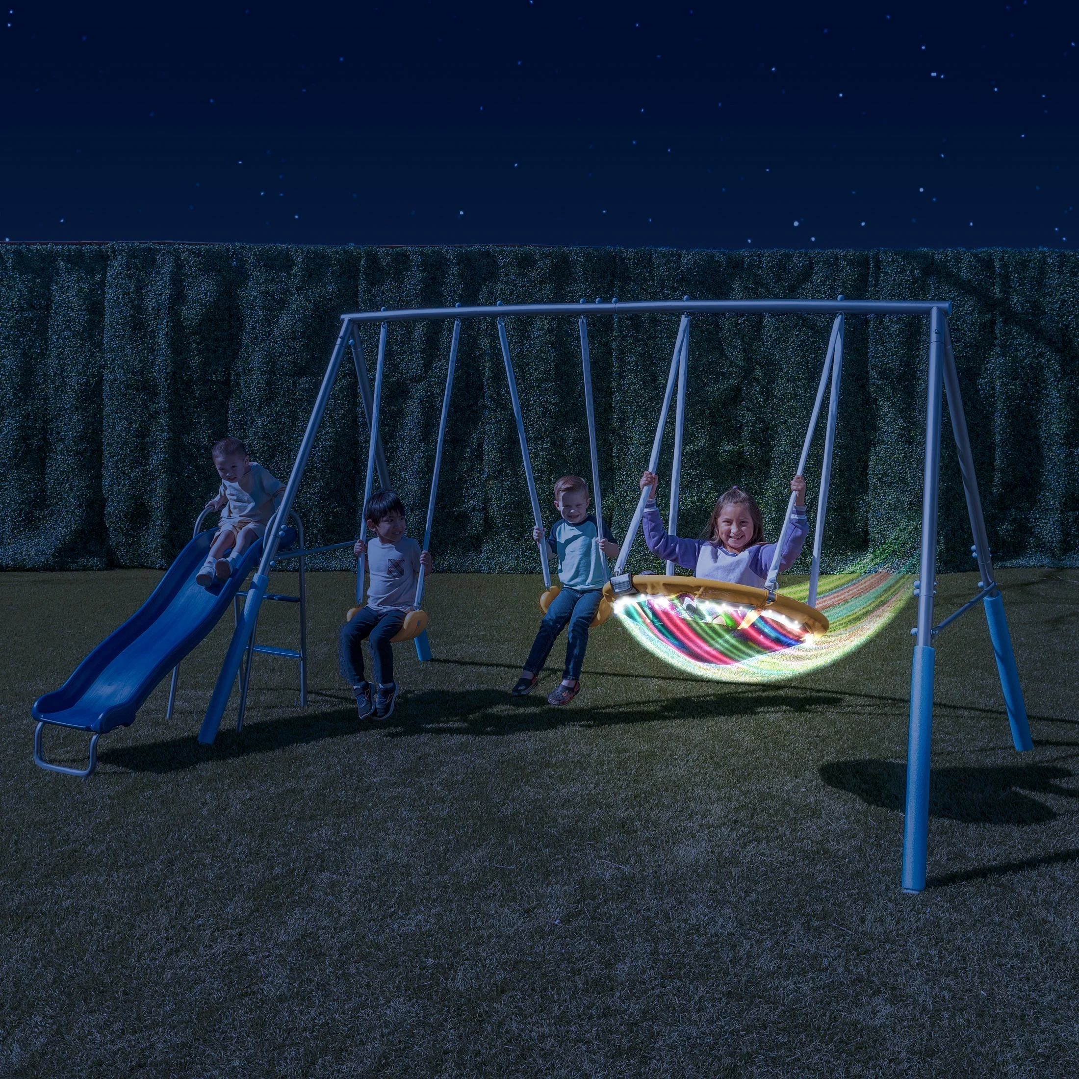 Sportspower Comet Metal Swing Set with LED Light up Saucer Swing, 2 Swings, and Lifetime Warranty on Blow Molded Slide - Womvr