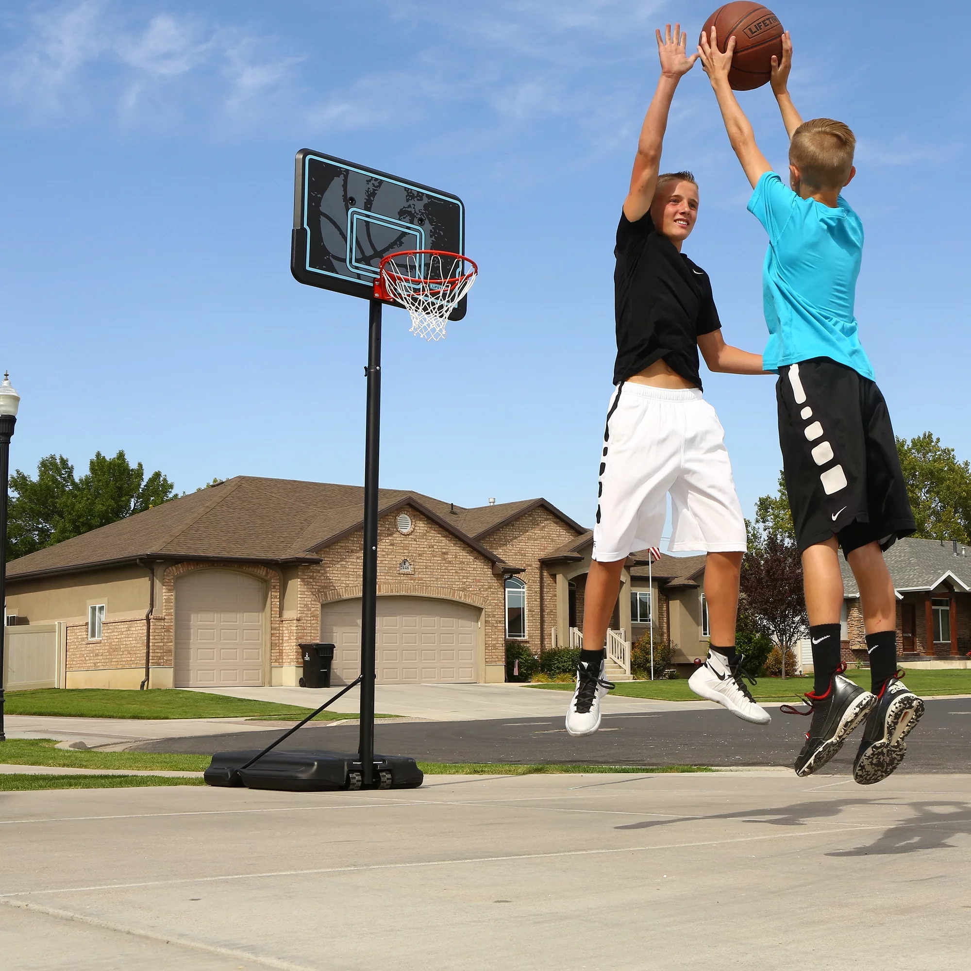 Lifetime Adjustable Portable Basketball Hoop, 44 inch HDPE Plastic Impact® (90759) - Womvr