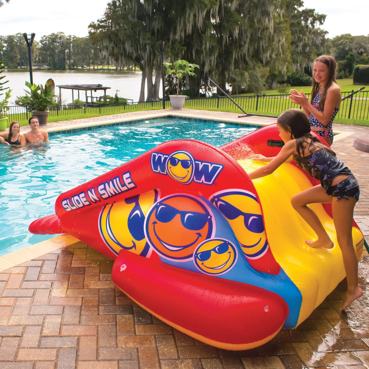WOW Sports Slide N Smile Inflatable Pool Slide with Sprinklers for Kids and Adults - Womvr