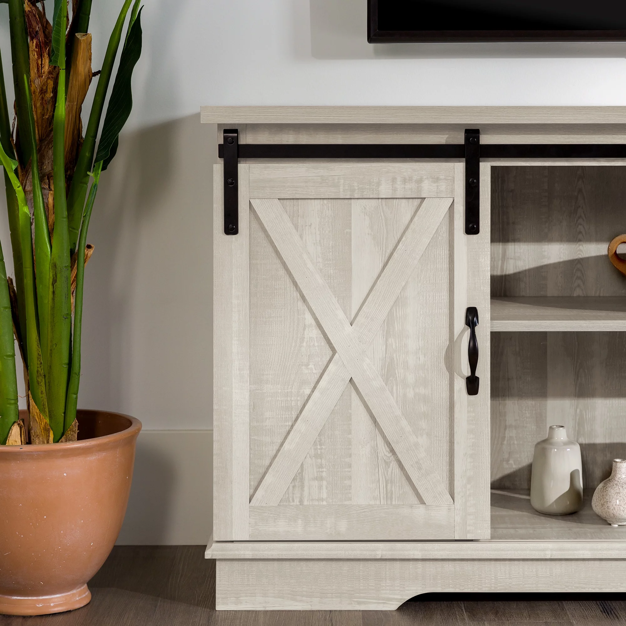 Woven Paths Farmhouse Sliding Barn Door TV Stand for TVs up to 65