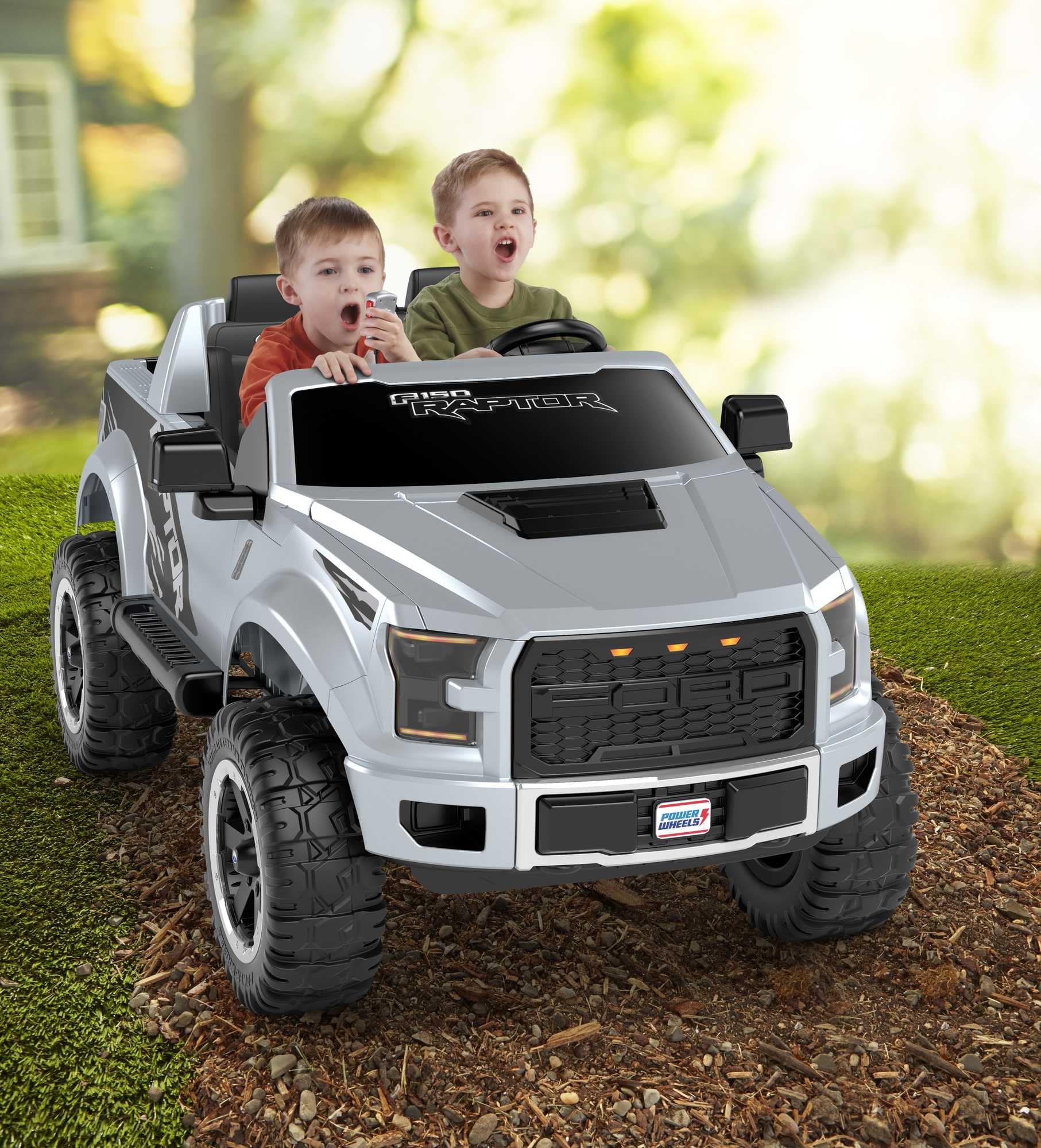 Power Wheels Ford F150 Raptor Battery-Powered Ride-On Vehicle with Music Sounds & Microphone, 12V - Womvr