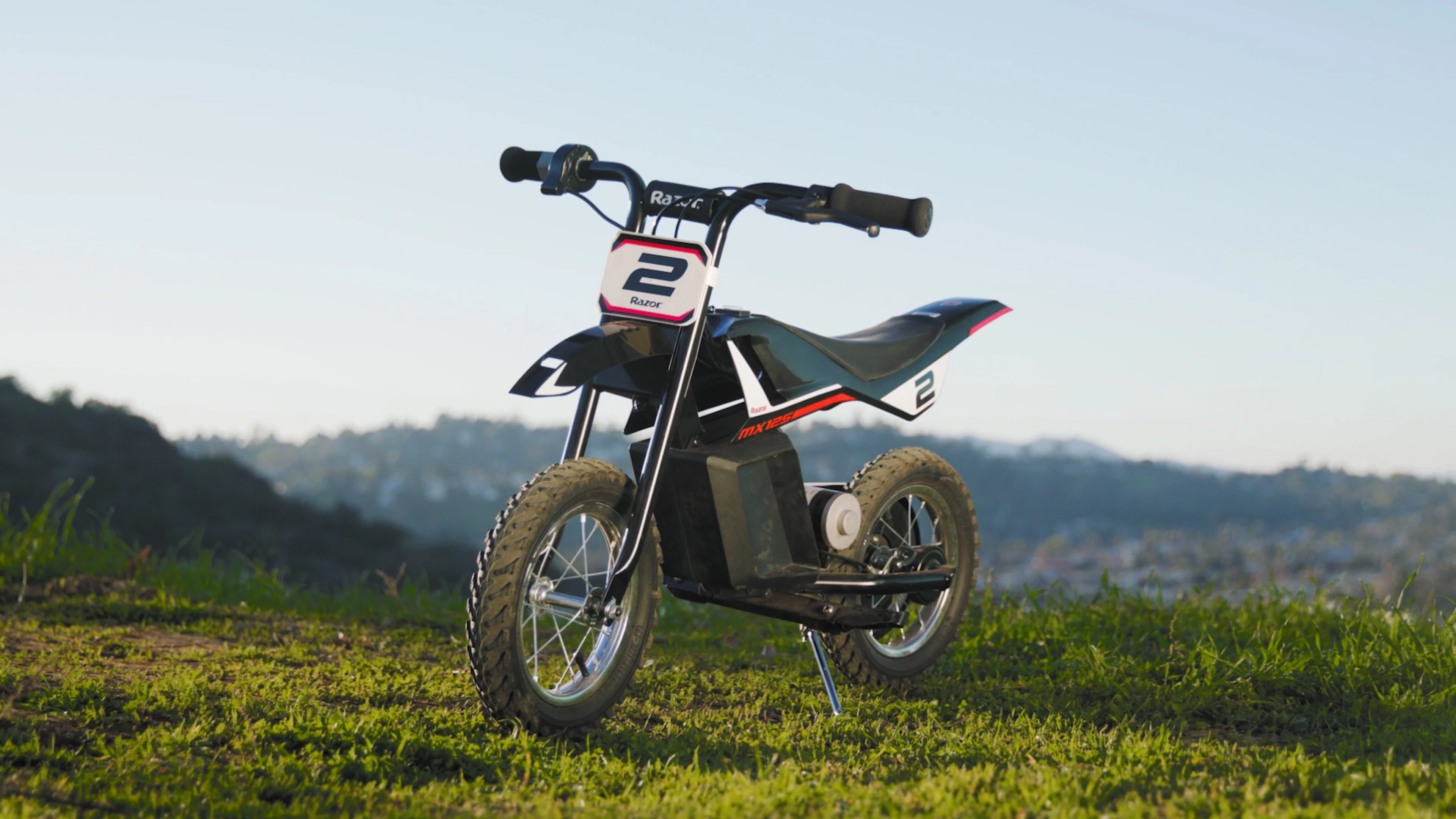 Razor Miniature Dirt Rocket MX125 Electric-Powered Dirt Bike - Black with Decal Included, Recommended For Kids 7+ Between 40 and 80 lbs - Womvr