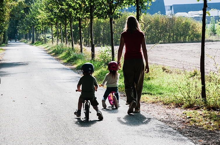 Chillafish Charlie lightweight toddler balance bike with carry handle, adjustable seat and handlebar, puncture-proof 10-inch wheels, for kids 18-48 months, Red - Womvr